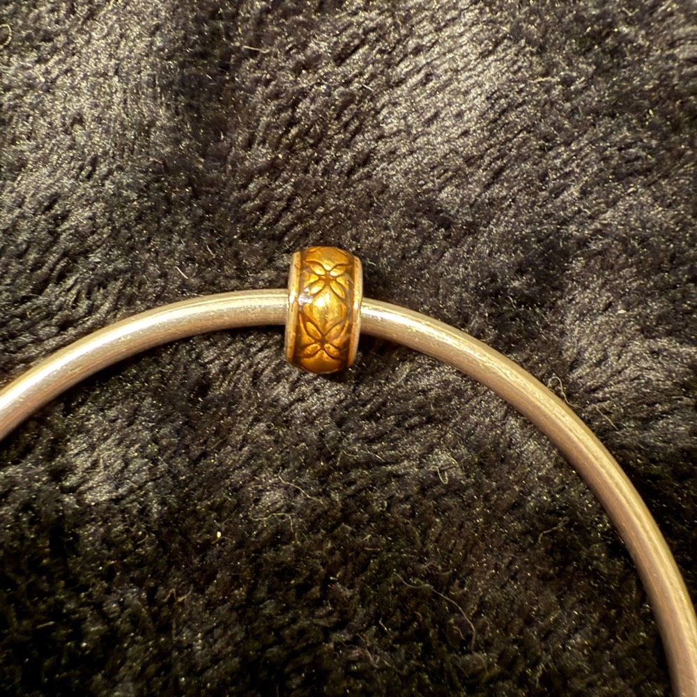 Amber colored Pandora charm